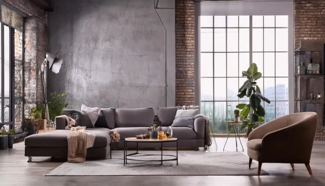 salotto stile industrial con elementi greige