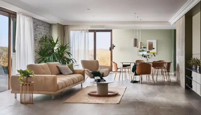 salone con posa a correre delle piastrelle 60x120 in gres porcellanato 